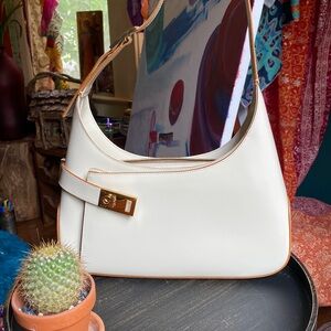 Salvatore Ferragamo cream leather handbag.
